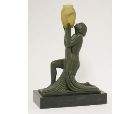 An Art Deco-style table lamp,after Pierre Le Faguays, modelled as a lady bare-breasted, holding an urn aloft,38cm high