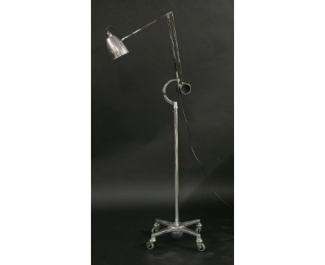 An Anglepoise polished chrome lamp,raised on a trolley base,160cm high