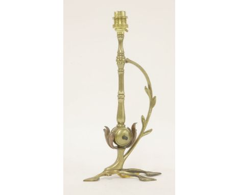 A brass and copper table lamp, designed by W A S Benson, with a naturalistic stand and with a patent Benson switch, 33.5cm hi