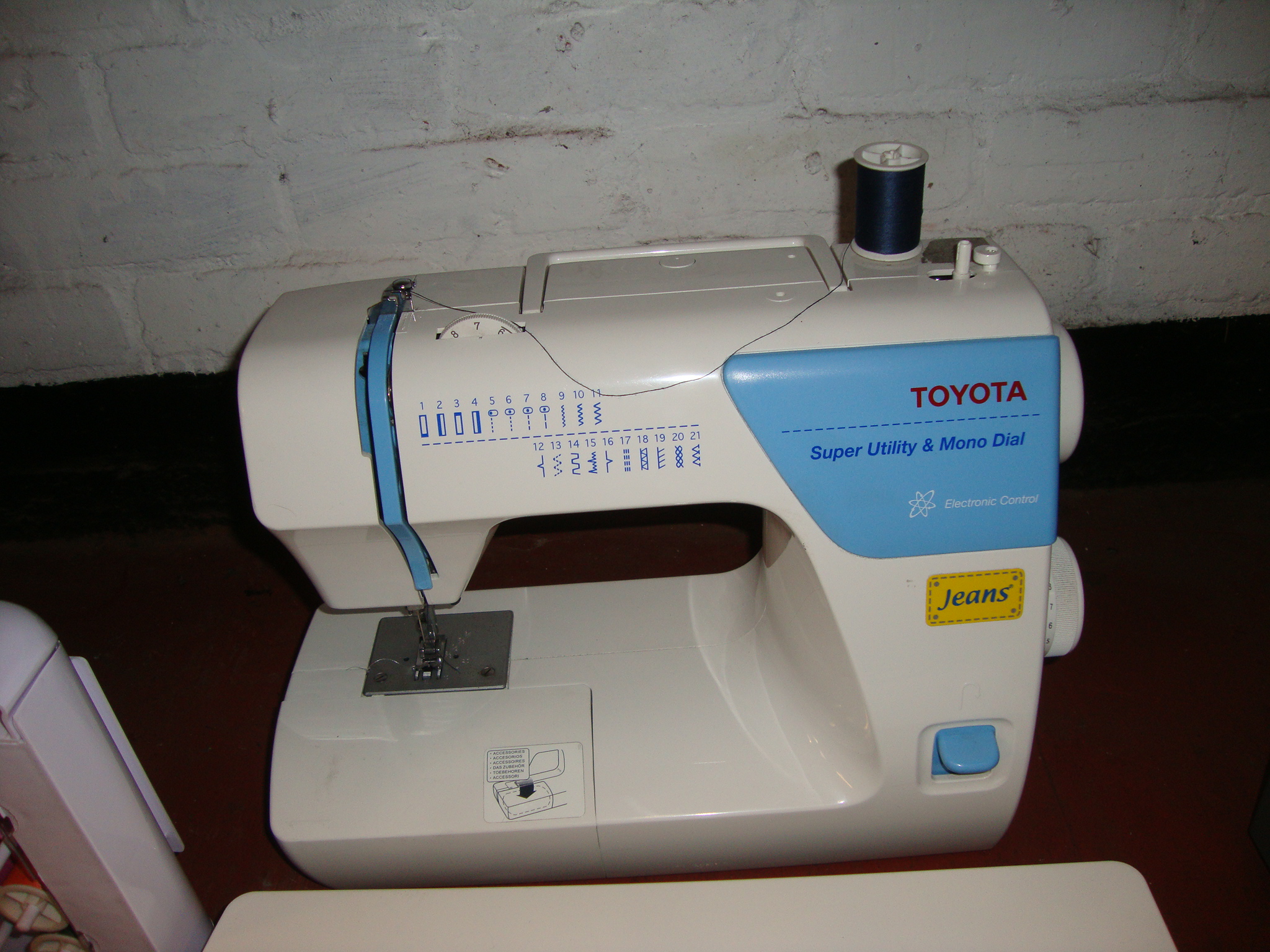 Toyota Super Utility & mono dial sewing machine including bench system