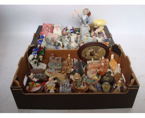 A mixed lot to include novelty teapots, Lladro figurine holding a parasol, a porcelain figure of a boy wearing a tricorn hat 