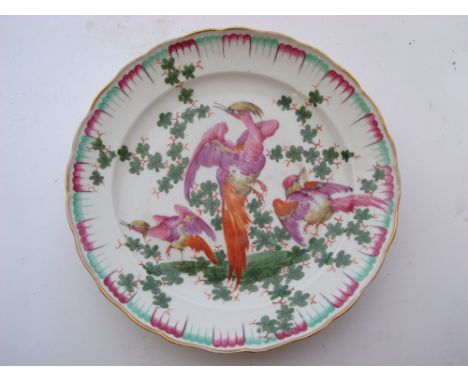 A late 19th Century Samson porcelain plate in Chelsea style, decorated in bright coloured enamel with exotic birds and foliag