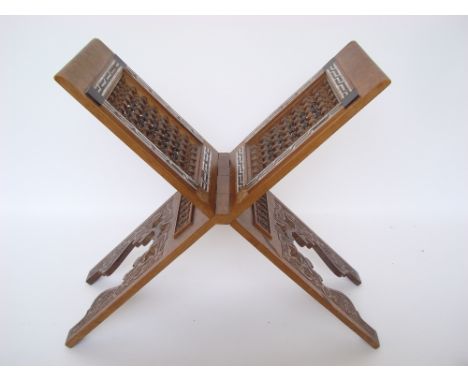 An early 20th Century Syrian Damascus carved and mother of pearl inlaid folding Koran stand. 