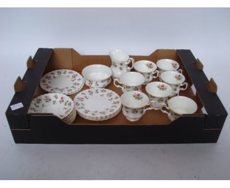 A Royal Albert 'Winsome' pattern six setting tea service, two plates a/f. 