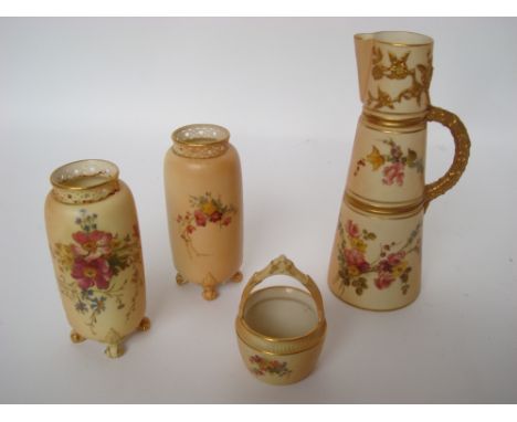 Royal Worcester blush ivory ware comprising a pair of cylinder vases, with pierced rims on scroll feet, decorated with floral