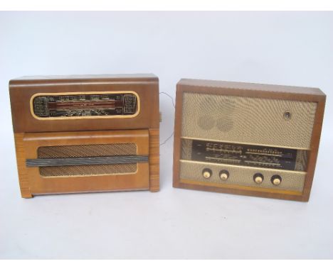 A 1950's teak cased Murphy valve radio together with a walnut cased valve radio and record player (2). 