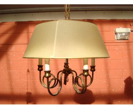 A five light gilt brass chandelier with shade. 