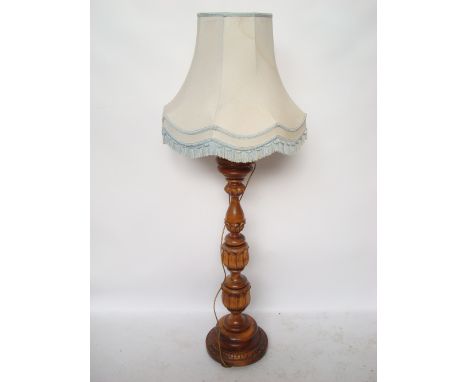 An Indian hardwood standard lamp. 