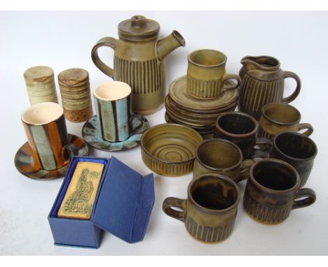 A Tremar studio pottery coffee part service comprising coffee pot, milk jug, sugar bowl, seven coffee cups and eight saucers 