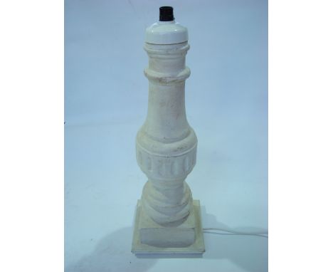 A reconstituted stone lamp base. 
