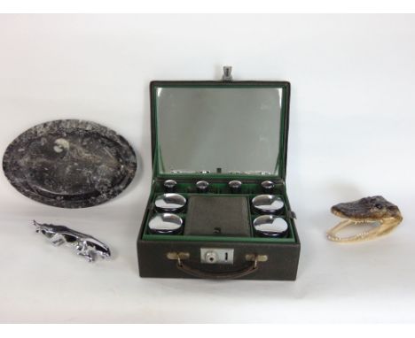 Vintage chrome jaguar mascot together with a further taxidermy alligator head, a fossilized plate and chrome and glass vanity