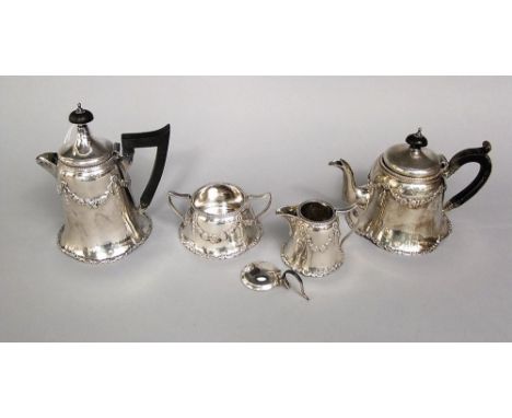 Pretty matched four piece early 20th century silver tea service, embossed with floral swags, 25oz approx