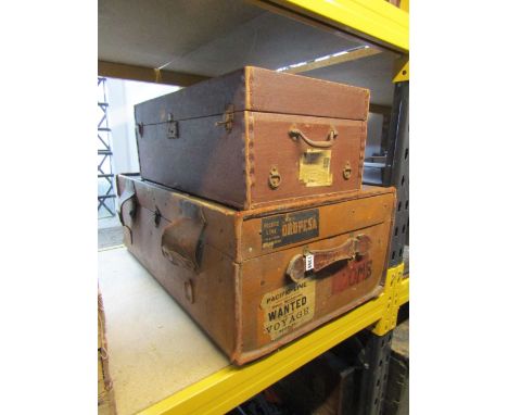 A vintage brown fibre and leather re-enforced travelling trunk with applied labels, together with one other slightly smaller 