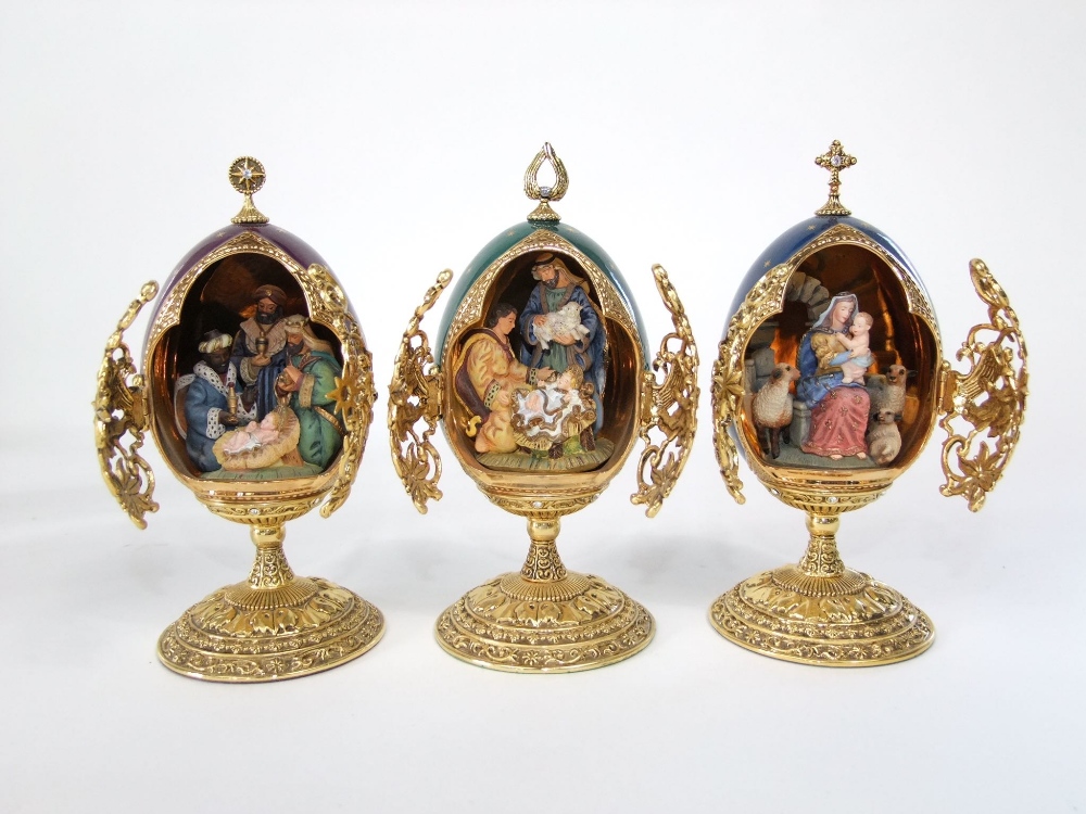 A collection of six Franklin Mint model eggs in the Faberge style, all