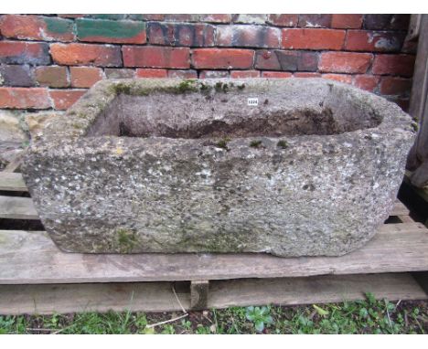 A good weathered composition stone trough of rectangular form with single rounded end 84 cm long x 54 cm wide x 26 cm deep ap