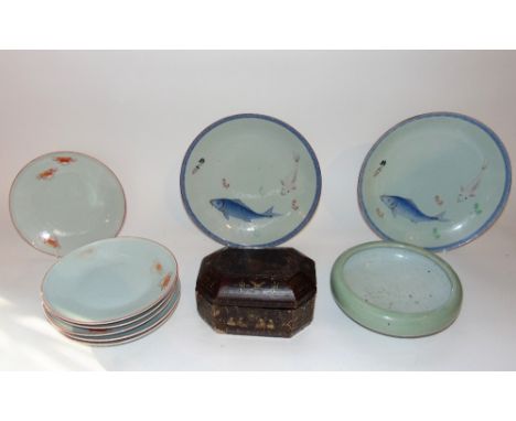 A Chinese Celadon ground open bowl, six dishes with crab detail, two further dishes decorated with carp, together with a 19th