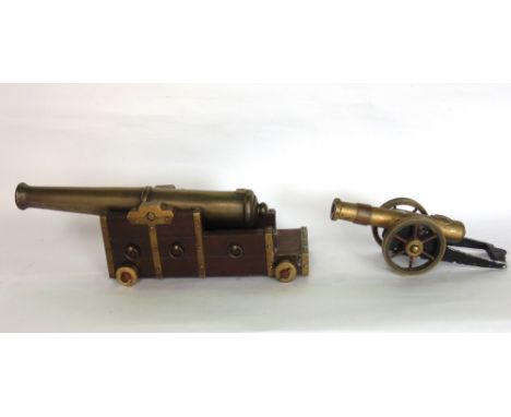 Two cast scale model canons