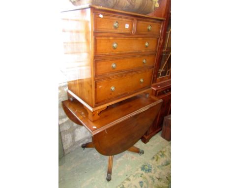A Georgian style yew wood veneered chest of three long and two short graduated drawers, crossbanded and raised on bracket sup