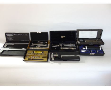 Eight boxes of various engineers and scientific tools
