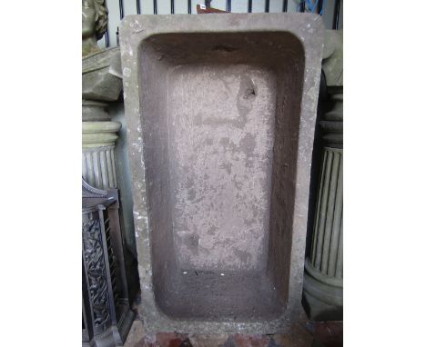 A good natural stone trough of rectangular form with rounded corners, approx 120 cm long x 64 cm wide x 40 cm deep 