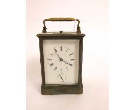 Brass repeater carriage clock, the squared dial with Roman numerals and subsidiary dial, the back with slow /fast adjustment,