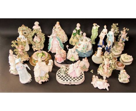 A quantity of ceramic models of ladies in 18th century style costume some inscribed to base J.D. Webb Bristol, also cherubs, 