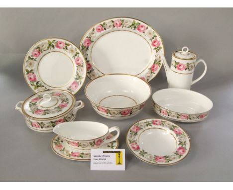 A collection of Royal Worcester Royal Garden pattern dinner and coffee wares including a pair of covered tureens, circular se