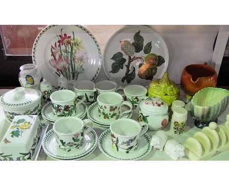 A quantity of Portmeirion Botanic Garden pattern ware comprising butter dish and cover, circular pot and cover, six cups and 