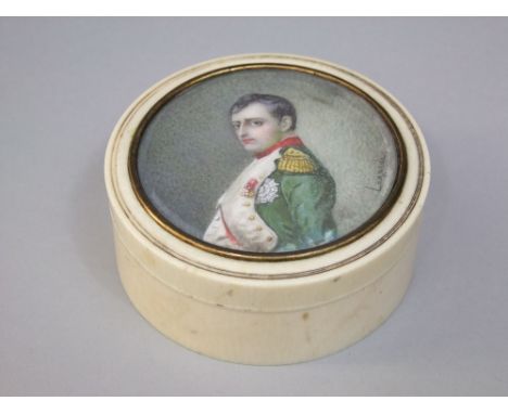 A late 19th century turned ivory box and cover, inset with a painted portrait of Napoleon, signed Lagarde, 10 cm diameter