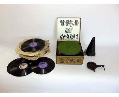 The Joyphone tin cased child's record player with a collection of various records