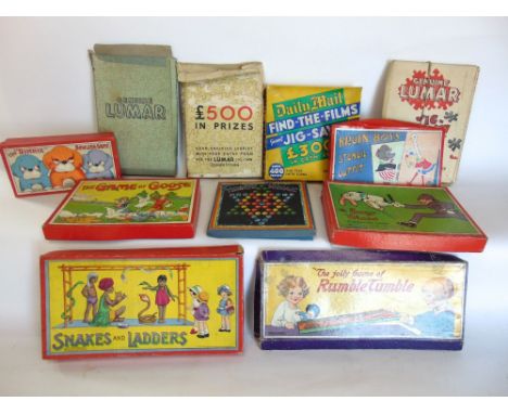 A collection of vintage games to include The Dinkie Bowling Game, The Bruin Boys Stencil Outfit, The Bonzo Chase, The Goose g