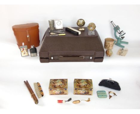 A mixed miscellaneous lot to include a vintage cased typewriter, vintage cased binoculars, students microscope and further bi