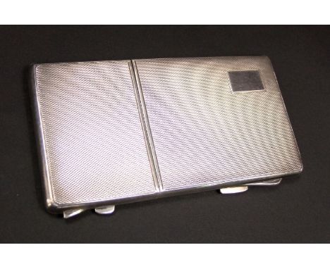 1940s silver engine turned cigarette case and compact, maker J.G. Ltd, Birmingham 1948, 6oz approx (gross) 13 cm long
