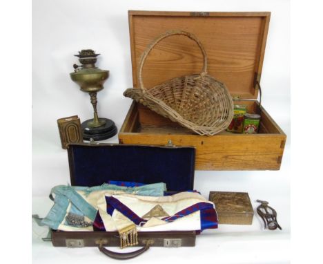 Mixed lot to include a leather case fitted with Masonic regalia, a brass oil lamp, advertising tins, kukri, a bottle opener a