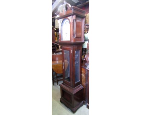 A contemporary longcase clock by the Emperor Clock Company Ltd enclosing three train striking movement, with broken arched di