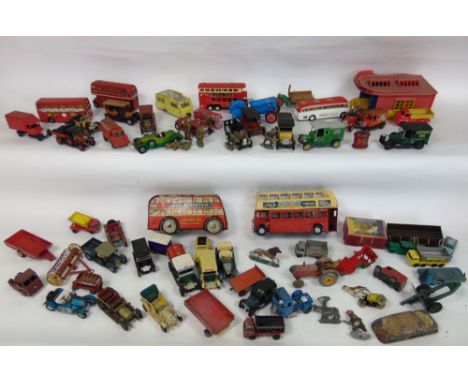 A box containing a collection of vintage die cast toys to include dinky, crescent and others