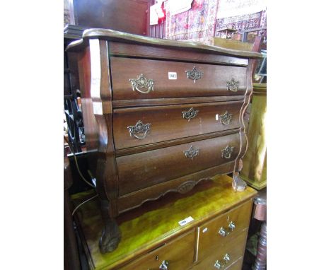 A small Dutch style bombe commode of three long drawers with moulded outline raised on claw and ball supports, 76 cm wide app