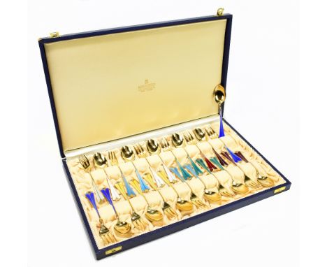 DAVID ANDERSEN; a cased set of twelve pairs of silver gilt and enamel dessert forks and spoons, in original boxAdditional Inf