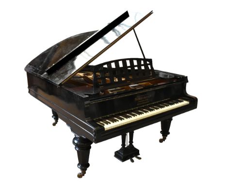 SCHIEDMAYER; a circular 1900-05 ebonised grand piano, the fall board inscribed in gilt ‘Paris 1900 Grand Prix, 1904 St Louis,