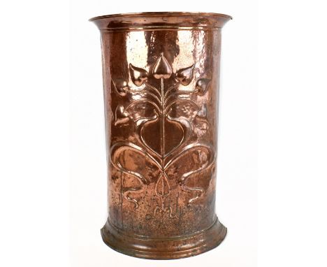 An Arts &amp; Crafts copper plated beryllium stick stand, the body with embossed Arts &amp; Crafts detail and planished decor