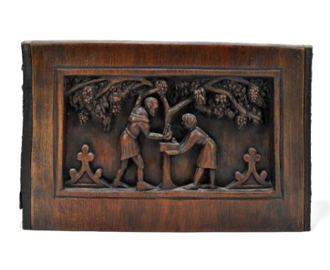 A contemporary carved panel inscribed verso 'The Vintage', based on an early Misericord carving in Gloucester Cathedral, 23.5
