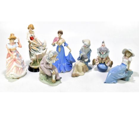 LLADRO; a model of a young clown seated upon a ball, height 17.5cm, with three Nao figures, and three further figures (7).Add