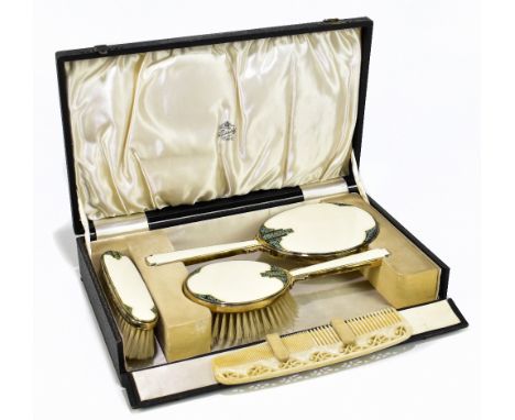 H PIDDUCK &amp; SONS; a hallmarked silver and enamel three piece dressing table set, London 1936, fitted in original box.Addi