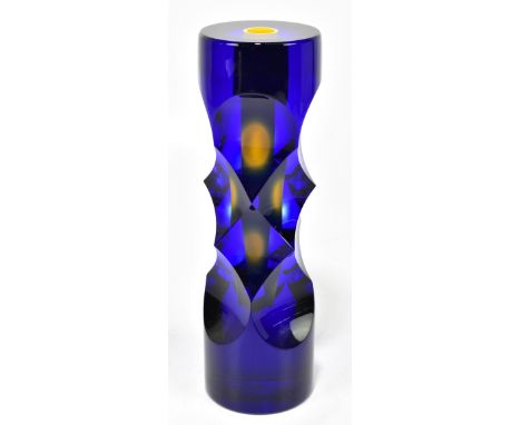 An impressive Czechoslovakian glass vase of cylindrical form with internal tube and faceted detail, indistinctly signed Povel