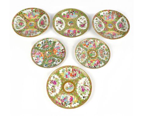 A pair of late 19th century Chinese Canton footed bowls decorated with figures and birds in panels, diameter 24cm, and four l