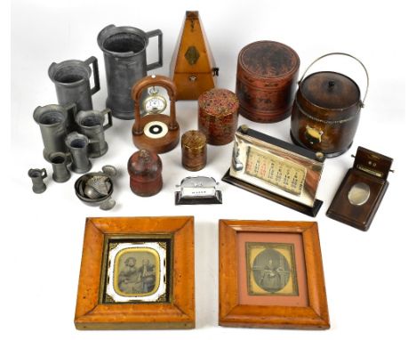 A 1920s oak biscuit barrel, a set of seven French pewter measures, a metronome, a Victorian carved walnut and ivory pocket wa