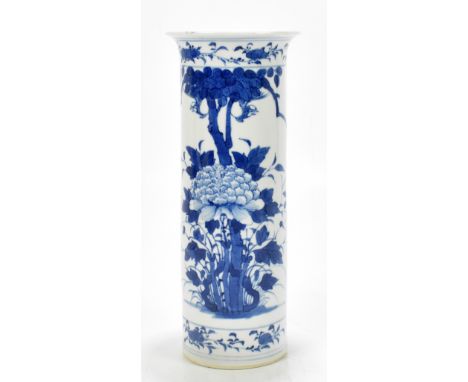 A 19th century Chinese blue and white porcelain sleeve vase, decorated with a lotus flower and floral sprays, bears four char