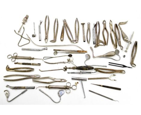 A collection of vintage dentists' tools.