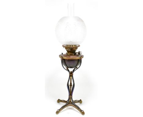 An Arts &amp; Crafts copper and brass oil lamp in manner of W.A.S, Benson, height including chimney 66cm.