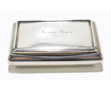 NATHANIEL MILLS; a George IV hallmarked silver snuff box of rectangular form, inscribed 'James Bruce' to the cover, with gild